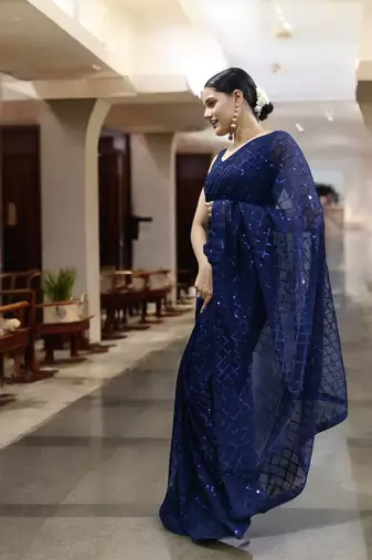 blue georgette sequins saree with unstitched blouse piece