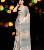 green georgette sequins saree with unstitched blouse