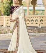 Off white georgette embroidered wedding wear saree