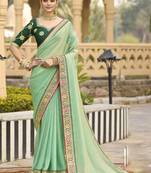 Light green georgette embroidered wedding wear saree
