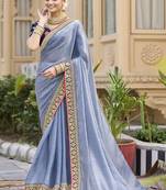 Lavender georgette embroidered wedding wear saree