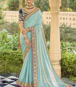 Sky blue georgette embroidered wedding wear saree