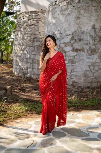 red heavy sequin saree