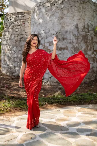 red heavy sequin saree