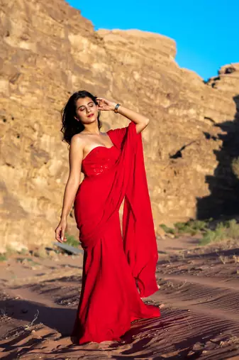 red ready made saree with stitched blouse