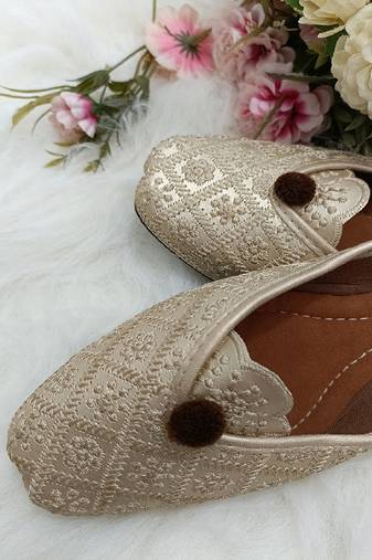 Beige front flip flats