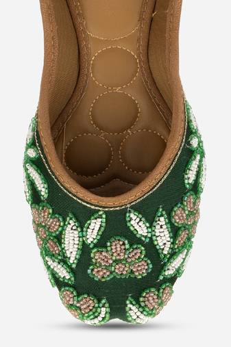 Green embroidered flats