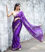 Purple embroidered satin saree.