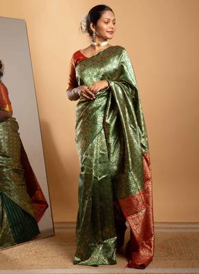 Green and red zari woven saree with floral motifs 1