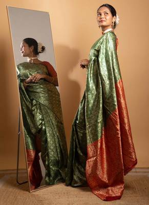 Green and red zari woven saree with floral motifs 3