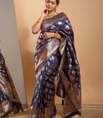 Navy blue zari woven saree with floral motifs and grand border