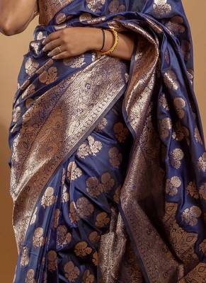 Navy blue zari woven saree with floral motifs and grand border 5