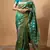 Turquoise green zari woven saree with intricate floral motifs