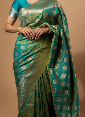Turquoise green zari woven saree with intricate floral motifs 3