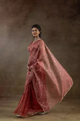 pre-stitched peach woven tissue crush saree