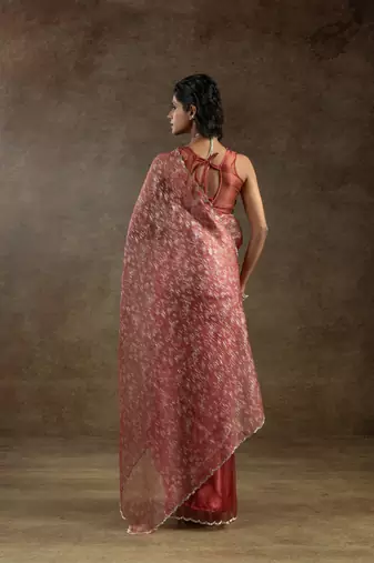 pre-stitched peach woven tissue crush saree