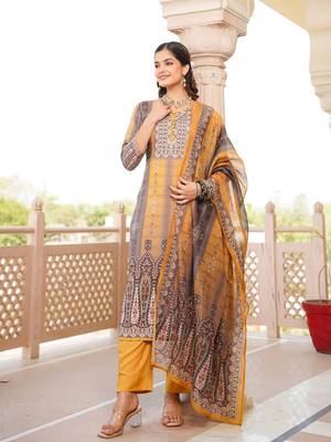 Women yellow rayon blend ethnic motifs printed straight kurta trouser with dupatta 3