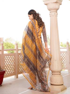 Women yellow rayon blend ethnic motifs printed straight kurta trouser with dupatta 4