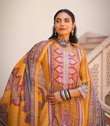 Women yellow rayon blend ethnic motifs printed straight kurta trouser with dupatta
