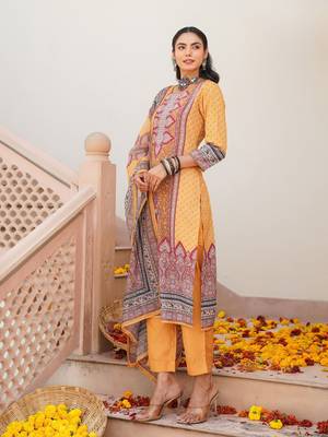 Women yellow rayon blend ethnic motifs printed straight kurta trouser with dupatta 3