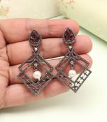 Deep magenta color fashion earrings