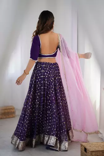 Purple bandhani flared lehenga set