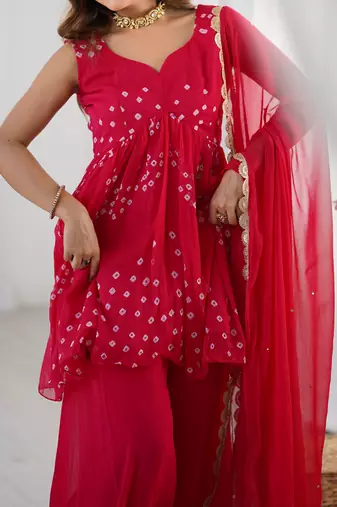 Crimson pink peplum kurta and flared palazzo set with dupatta