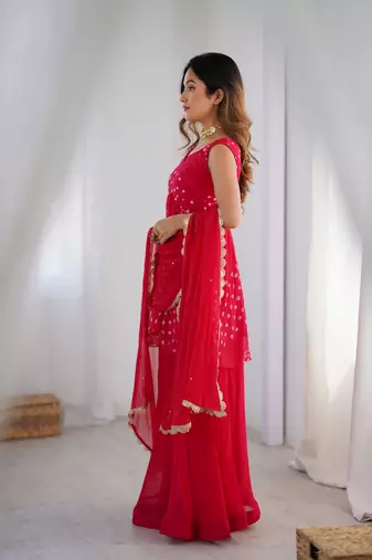 Crimson pink peplum kurta and flared palazzo set with dupatta
