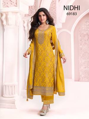Yellow viscose maslin jacquard with embroidery fancy coding sequin salwar suit 1