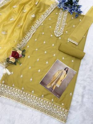 Yellow heavy orgenza with embroidery straight salwar suit 2
