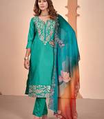 Sea green color ethnic and rich looks muslin salwar kameez for wedding wear