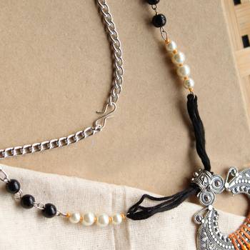 Dangling paan pearly pendant 5