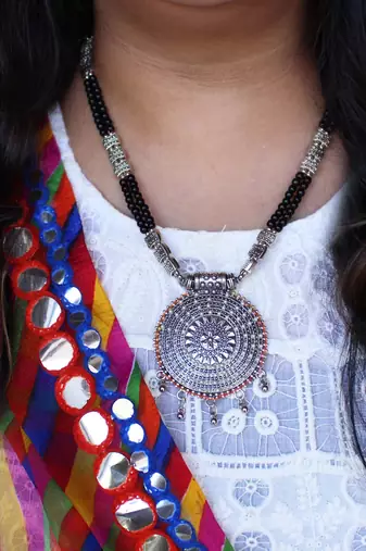Dana chakra embossed necklace