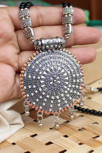 Dana chakra embossed necklace