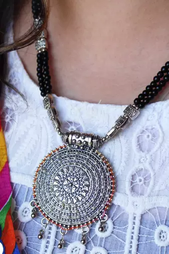 Dana chakra embossed necklace