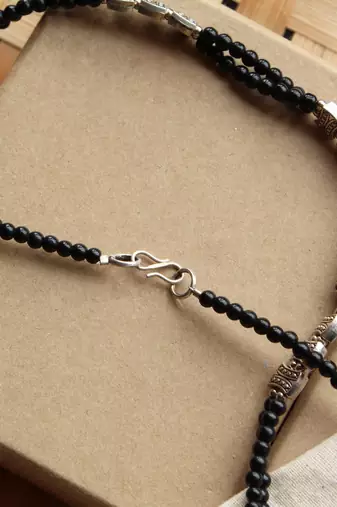 Dana chakra embossed necklace