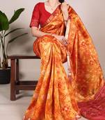 Orange zari weaving border with fancy tassels saree