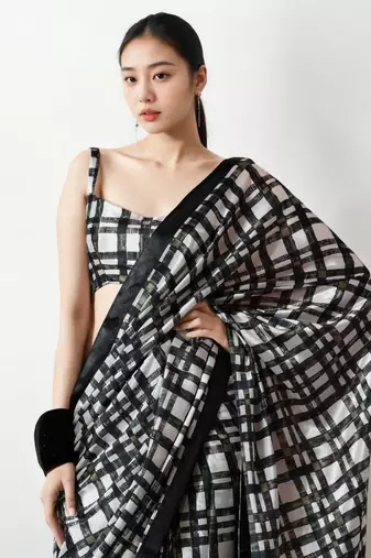 pre-stitched black chinnon digital print & lace border saree