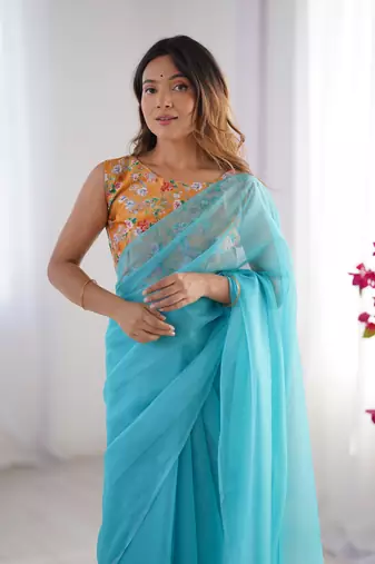 Sky blue burberry printed blouse partywear saree