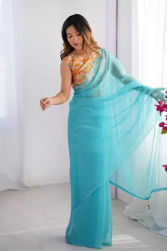 Sky blue burberry printed blouse partywear saree
