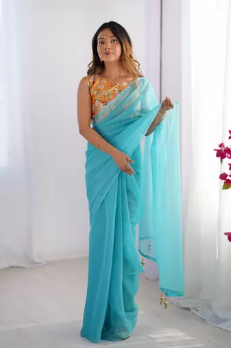 Sky blue burberry printed blouse partywear saree