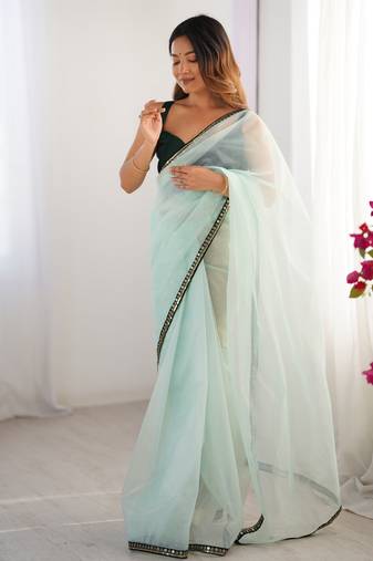 Sea green twill net embroidered lace saree