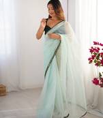 Sea green twill net embroidered lace saree