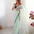 Sea green twill net embroidered lace saree