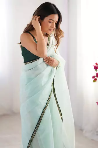 Sea green twill net embroidered lace saree