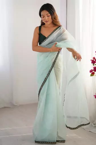 Sea green twill net embroidered lace saree