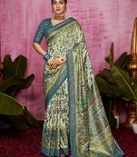 Aqua and off white woven polka dot and printed tussar silk blend saree