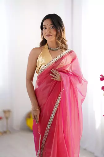 Pink twill net solid lace border style saree