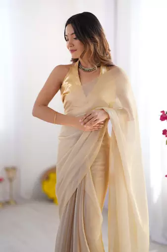 Peach satin gold organza solid lace border style saree