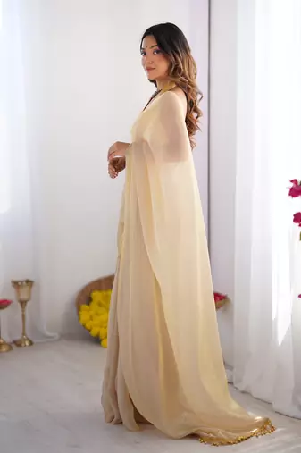 Peach satin gold organza solid lace border style saree